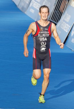 Stockholm - 23 Ağustos 2015: Triatloncu Gregory Billington (Usa), 23 Ağustos 2015 tarihinde İsveç 'in Stockholm kentinde düzenlenen Erkekler Itu Dünya Triatlon Şampiyonası finalinde yarışacak.