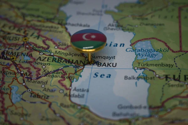 Baku pinned on a map with the flag of Azerbaijan