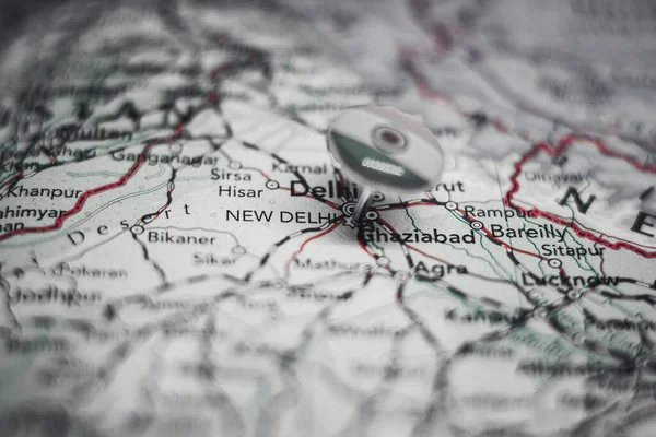 New Delhi pinned on a map with the flag of India