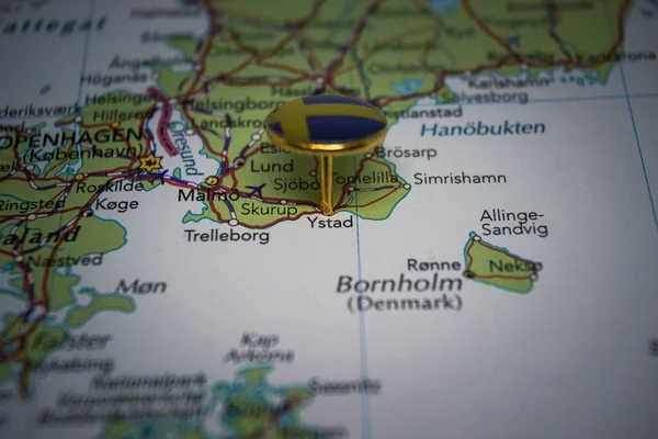 Ystad pinned on a map with the flag of Sweden