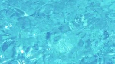 Blue ripped water in a swimming pool