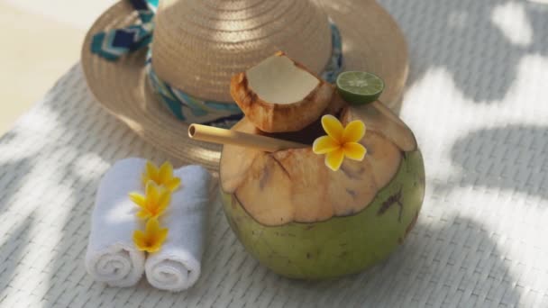 Video Footage Green Young Coconut Close Bamboo Straw Sun Hat — Stock video