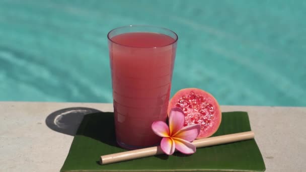 Video Footage Glass Pink Guava Juice Bamboo Straw Half Fresh — Stock Video