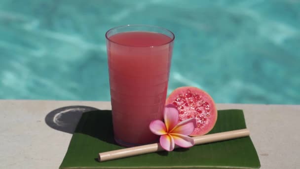 Video Footage Glass Pink Guava Juice Bamboo Straw Half Fresh — Stock Video