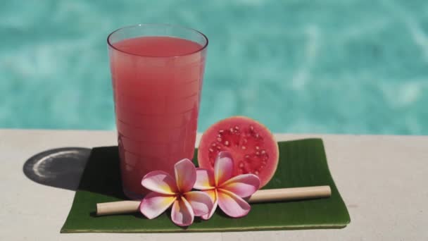 Video Footage Glass Pink Guava Juice Bamboo Straw Half Fresh — Stock Video