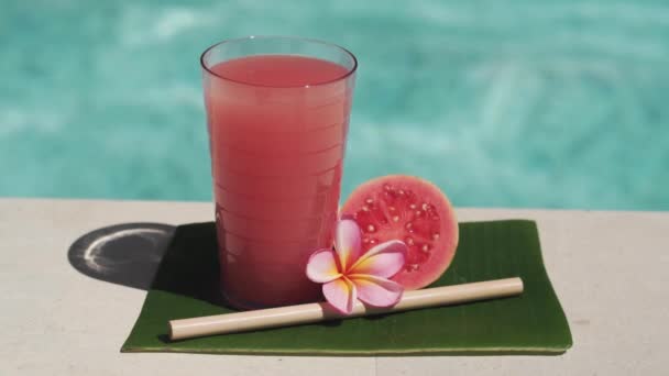 Video Footage Glass Pink Guava Juice Bamboo Straw Half Fresh — Stock Video