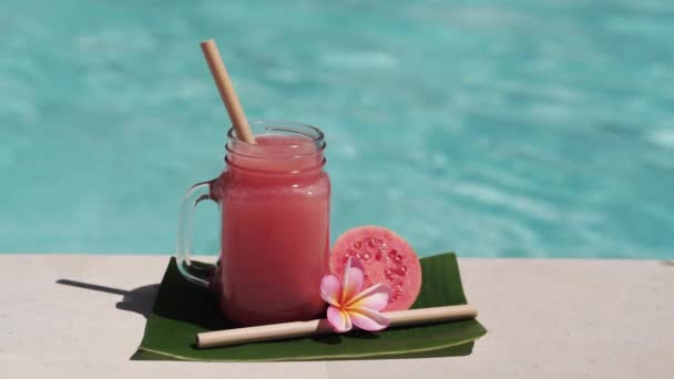 Video Footage Glass Mason Jar Pink Guava Juice Bamboo Straw — Stock Video