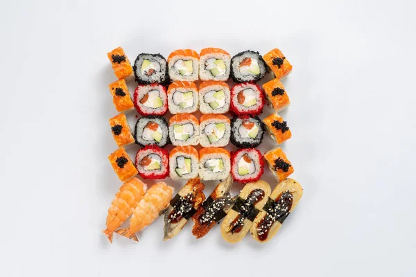 Duży Zestaw Różnych Rodzajów Sushi Maki Nigiri Neutralnym Tle Światła — Zdjęcie stockowe