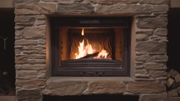 Classic fireplace with a burning fire — Stock Video