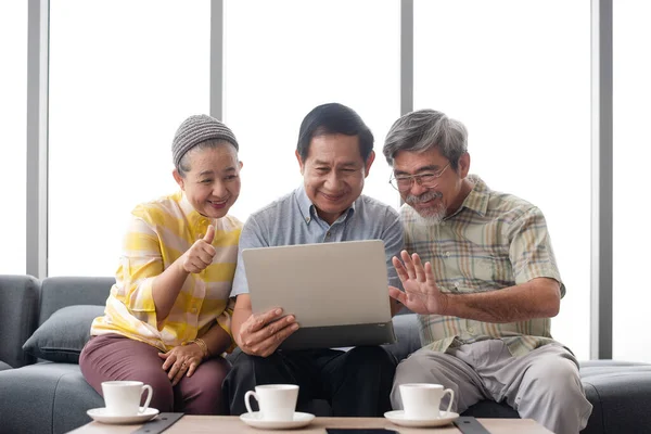 Group of asian grandparent talk with their family by online communication platform