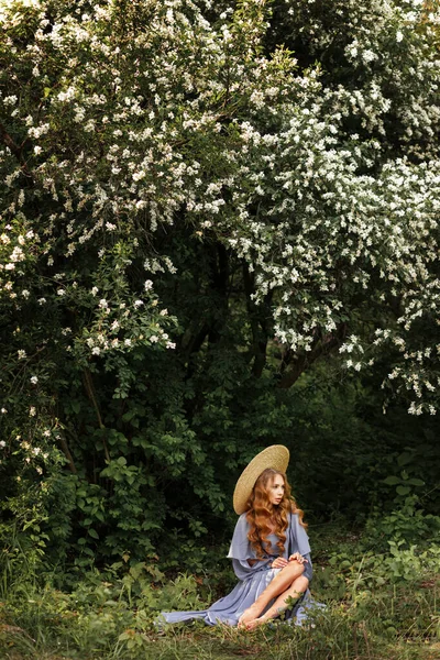 Girl Hat Sits Flowering Tree Summer — Stock Photo, Image