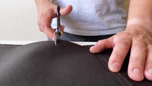 Man Cuts Fabric Cutting Table Scissors Close — Stock Video