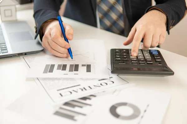 businessman at the table to sign a contract. close-up