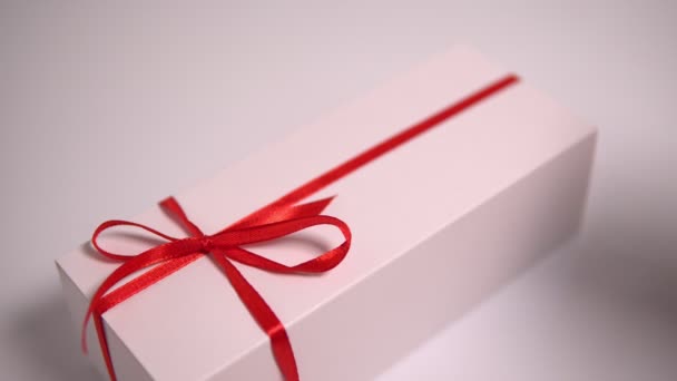 Women Hands Untie Red Ribbon White Gift Box — Stock Video