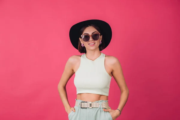 Beautiful Stylish Woman Hat Sunglasses Posing Pink Red Background Happy — Stock Photo, Image