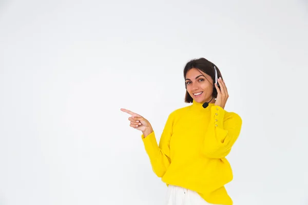 Pretty Woman Yellow Sweater White Background Manager Headphones Happy Smile — Stock Photo, Image