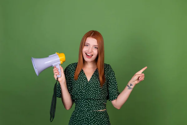 Young Red Hair Woman Green Background Megaphone Happy Excited Pointer — Stock Photo, Image