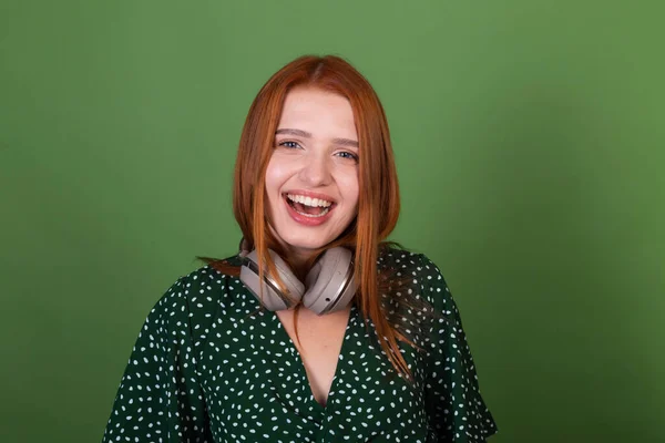 Young Red Hair Woman Green Background Wireless Headphones Happy Laugh — Stock Photo, Image