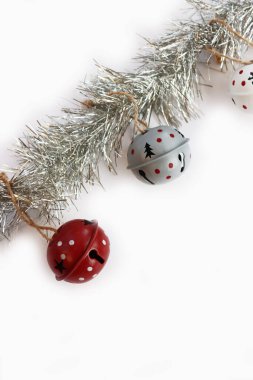 Silver Christmas wreath with gray, red, and white decorations isolated on white background