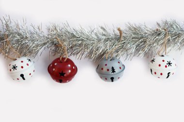 Silver Christmas wreath with gray, red, and white decorations isolated on white background