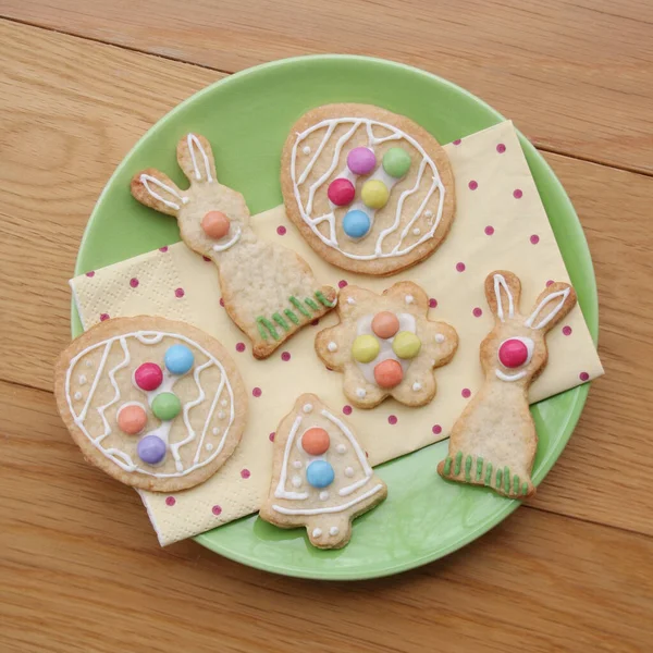 Easter Glazed Cookies Shape Egg Bunny Flower Bell Green Plate — Stock Photo, Image