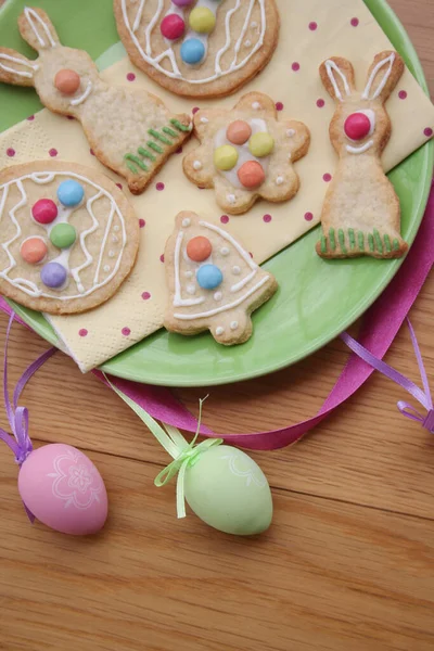 Easter Glazed Cookies Shape Egg Bunny Flower Bell Green Plate — Stock Photo, Image