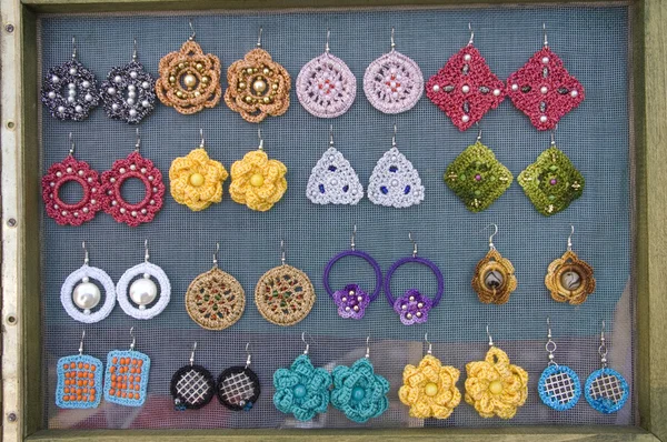 Handmade earrings  made of wool and plastic — Stock Photo, Image