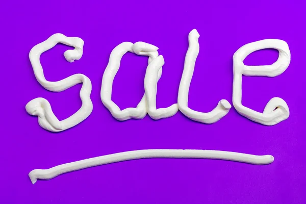 Sale sign on a purple background