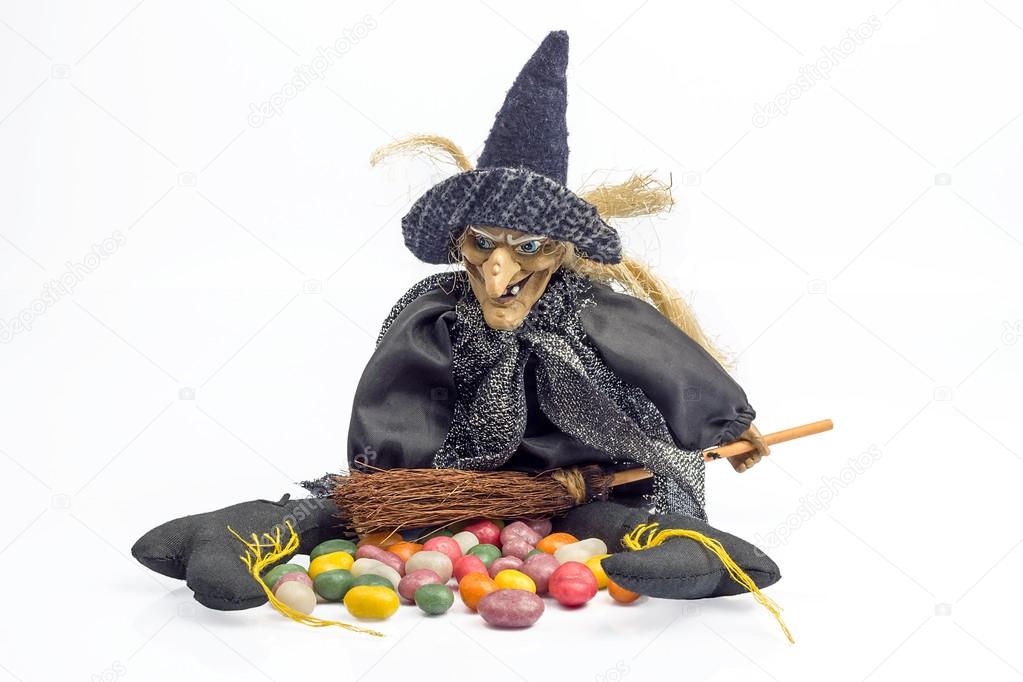 Halloween witch with candies