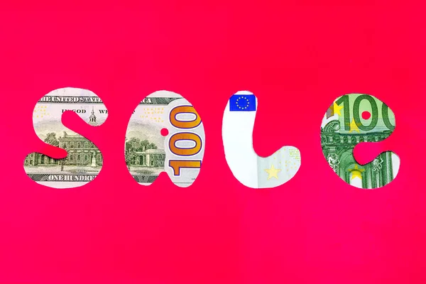 Satışı Doları/euro işareti kırmızı bir arka plan üzerinde