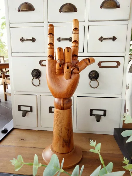 Wooden puppet hand symbol of love