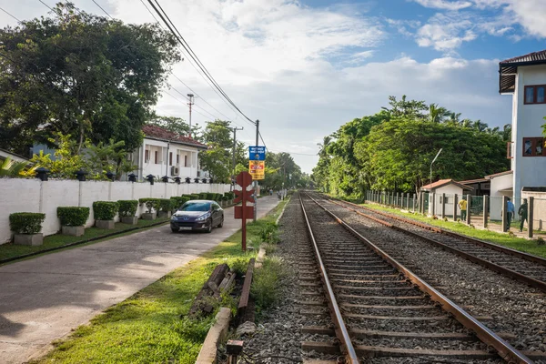 Railroad in the middle of a small town. — Stock Photo, Image