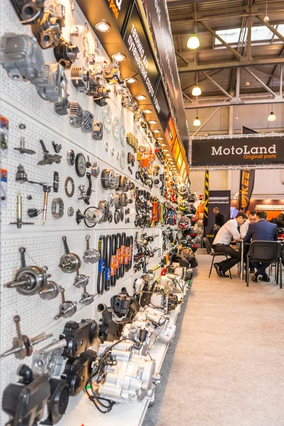 Motopark-2015 (BikePark-2015). The exhibition stand of MotoLand. The stand with spare parts. — Stock Photo, Image