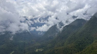 Beautiful mountain landscape, clouds on the top. Slovenian Alps. High quality photo