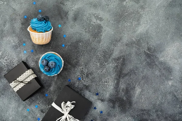 Tasty Muffins Blue Cream Gifts Dark Background Flat Lay Top — Stock Photo, Image