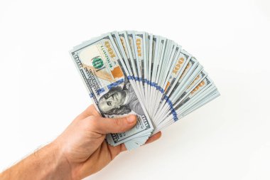 Beyaz arka planda izole edilmiş nakit paramız var. Amerikan dolarları