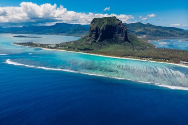 Tropical island with Le Morne mountain, blue ocean and coastline in Mauritius. Aerial view
