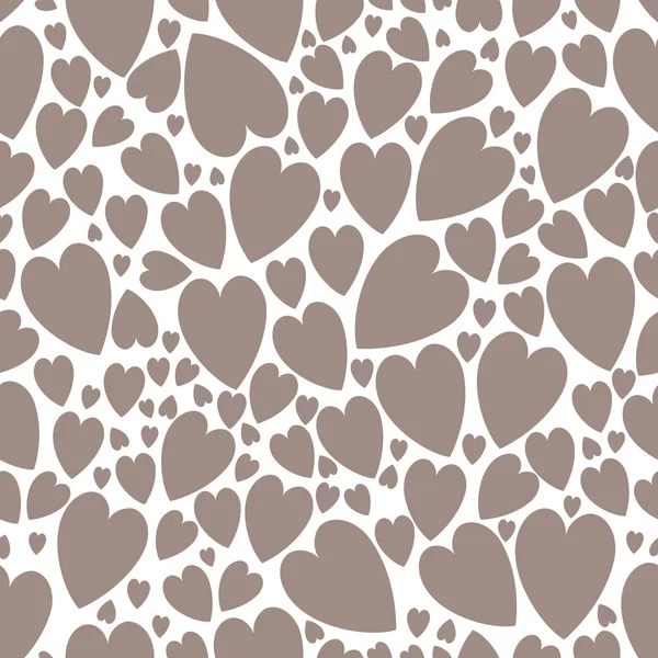 Chaotic seamless pattern of hearts — Stock Vector