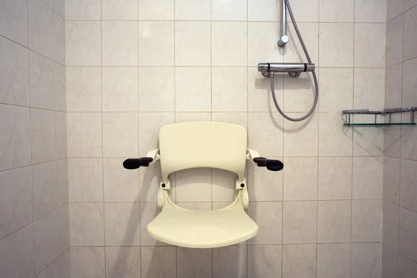 Shower seat wall mounted for disabled or elderly, shower for handicapped or senior home Stok Lukisan  