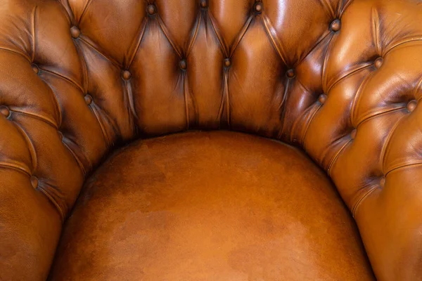 Bruin chesterfield Stijl lederen abstracte achtergrond textuur, fauteuil close up modern design — Stockfoto