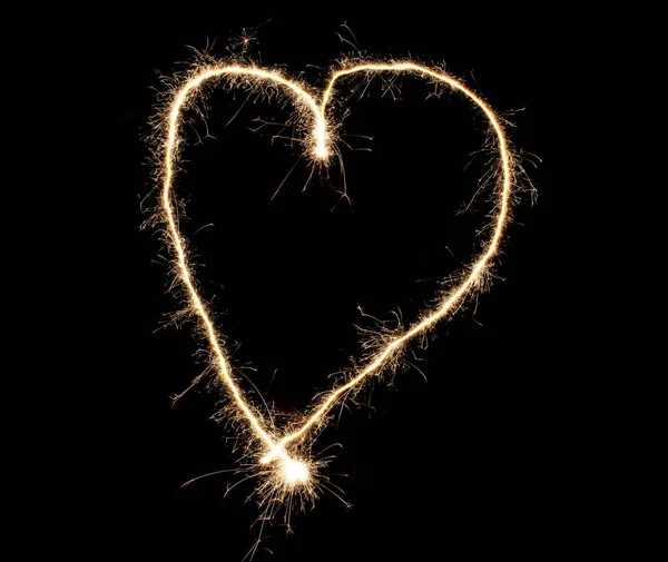 Coração brilhante feito de fogos de artifício. Bom elemento de design para casamento romântico, Dia dos Namorados ou conceito de amor — Fotografia de Stock