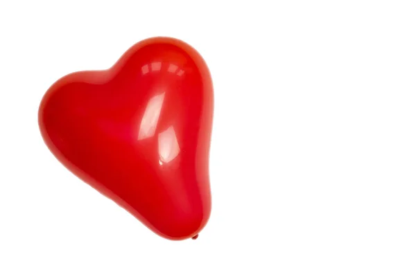 Pojedynczy czerwony balon serca izolowany na białym tle widok z góry. na urodziny lub koncepcja Walentynki — Zdjęcie stockowe