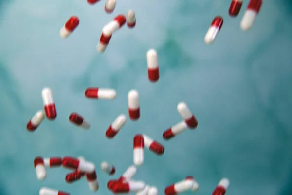 Pil obat jatuh latar belakang yang tidak fokus kabur, kapsul untuk Kesehatan, Vitamin, konsep obat-obatan, menyalin ruang desain modern — Stok Foto