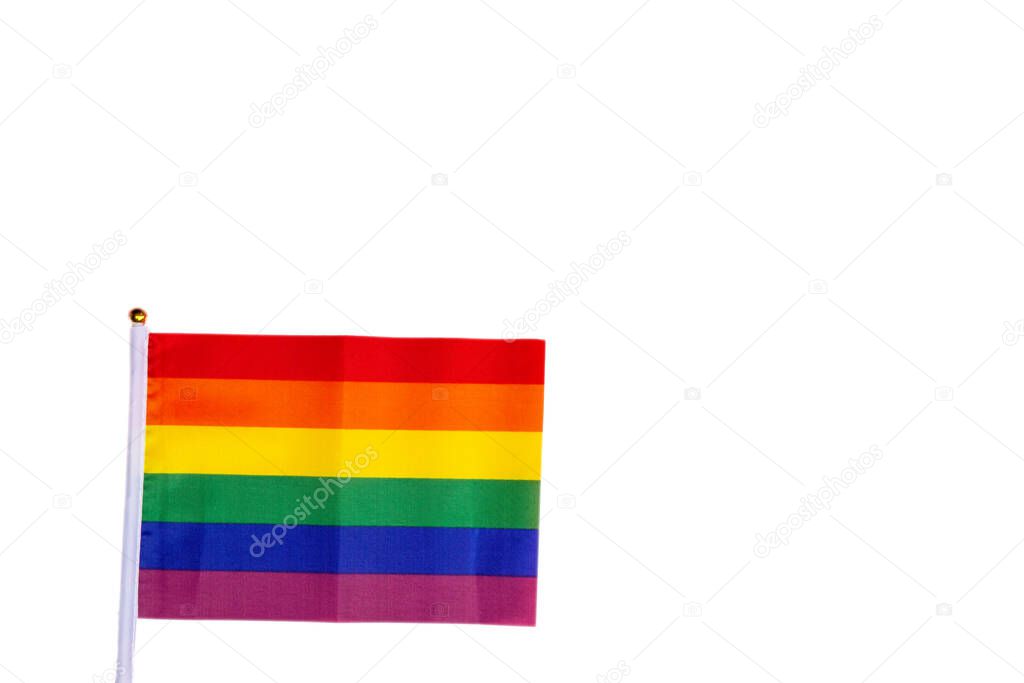 Rainbow flag bright colors standing for LGBT, Human rights and gay pride isolated on white background with copy space, modern design