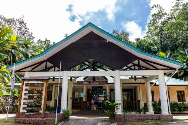 Praslin, Seychelles, 01.05.2021. Vallee de Mai Nature Reserve main entrance gate with ticket office.