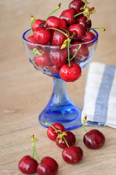 Cherries in a vase — Stock Photo, Image