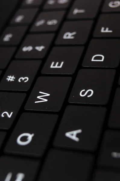 Black laptop keyboard — Stok fotoğraf