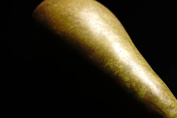 Green Brown Pear Black Background Closeup Light Dim — Stock Photo, Image