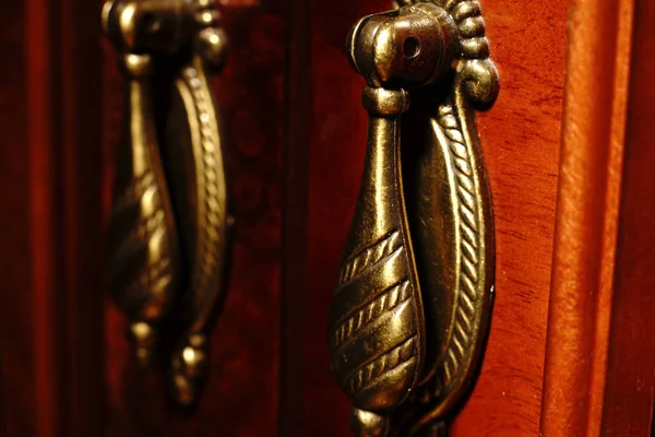Decorative elements of the carved mahogany cabinet. — Stock Photo, Image