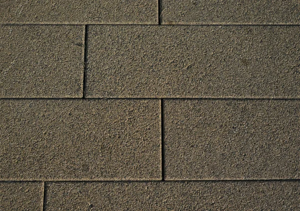 The texture of neatly laid tiles in the citys summer park — Stock Photo, Image